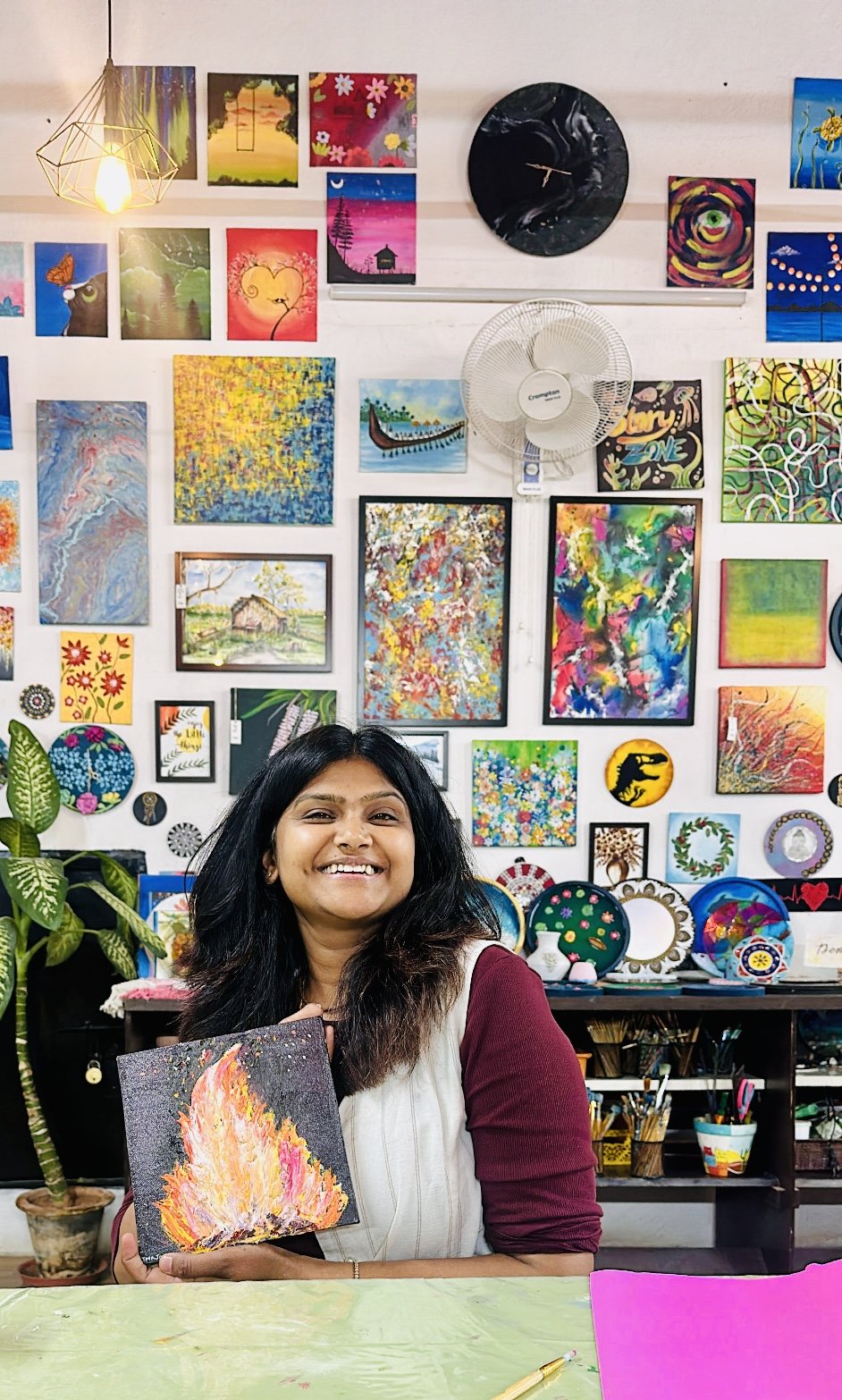 Artist at StoryZone with a textured canvas