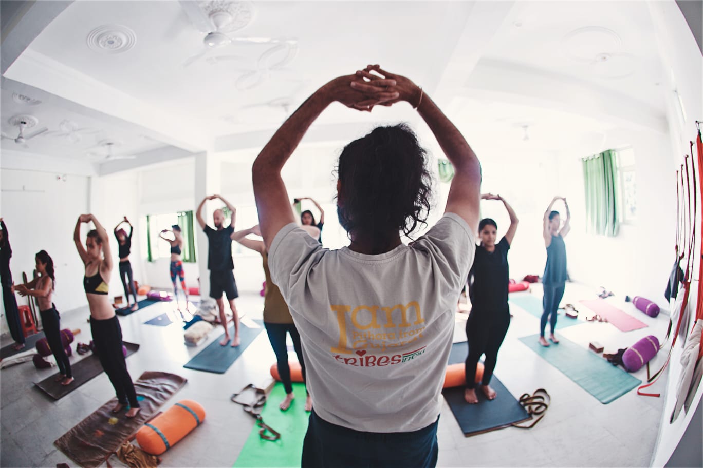 Group yoga therapy session led by Dr Deepak